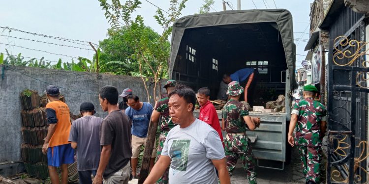 TNI Kuat Bersama Rakyat Gupusjat Opronik II Puspalad Gelar Karya Bakti