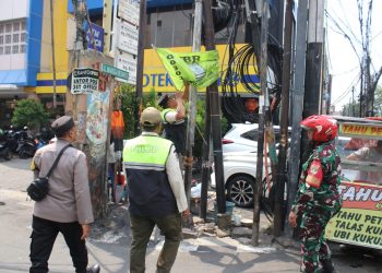 Operasi Berantas Jaya: Ruang Publik Tamansari Dibersihkan dari Atribut Ormas